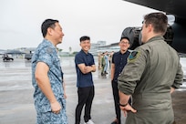 U.S. Air Force 1st Lt. Hayden Gebo, 345th Expeditionary Bomb Squadron B-1B Lancer pilot, out of Dyess Air Force Base, Texas, speaks to a group during a B-1B tour at Paya Lebar Air Base, Singapore, Jan. 20, 2024.  The U.S. Air Force’s partnership with the Republic of Singapore Air Force provides valuable professional exchanges and training opportunities with different aircraft and aircrews. (U.S. Air Force Photo by Senior Airman Ryan Hayman)