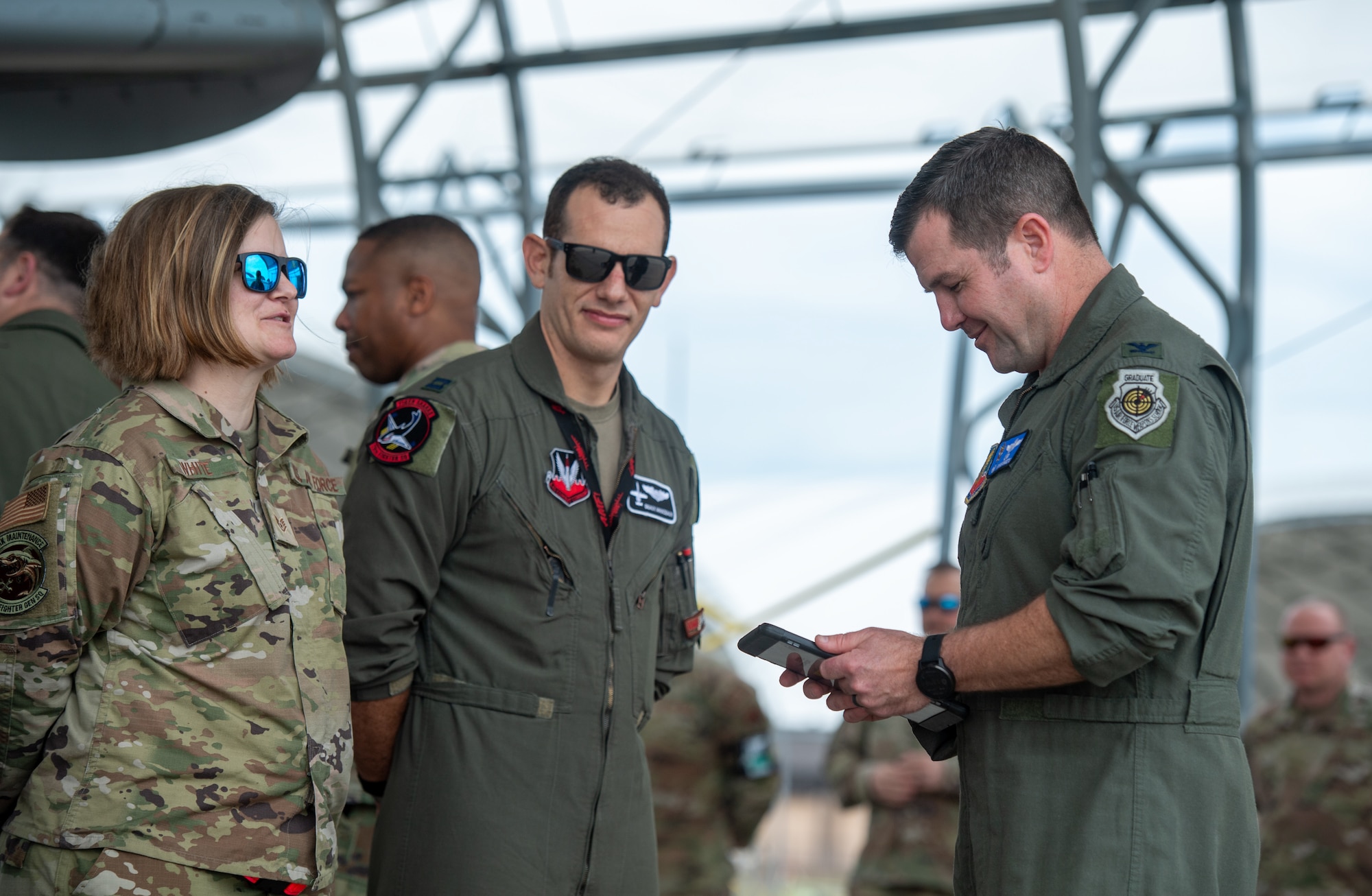 U.S. Air Force Col. Paul Sheets, 23rd Wing commander, tests Airmen on their aircraft knowledge during a Top Tiger competition at Moody Air Force Base, Georgia, Jan. 26th, 2024. Top Tiger is a quarterly competition that tests dedicated and assistant dedicated crew chiefs’ knowledge of maintenance Air Force Instructions, appearance of uniform and aircraft, and condition of their aircraft maintenance logs. (U.S. Air Force photo by Airman Cade Ellis)