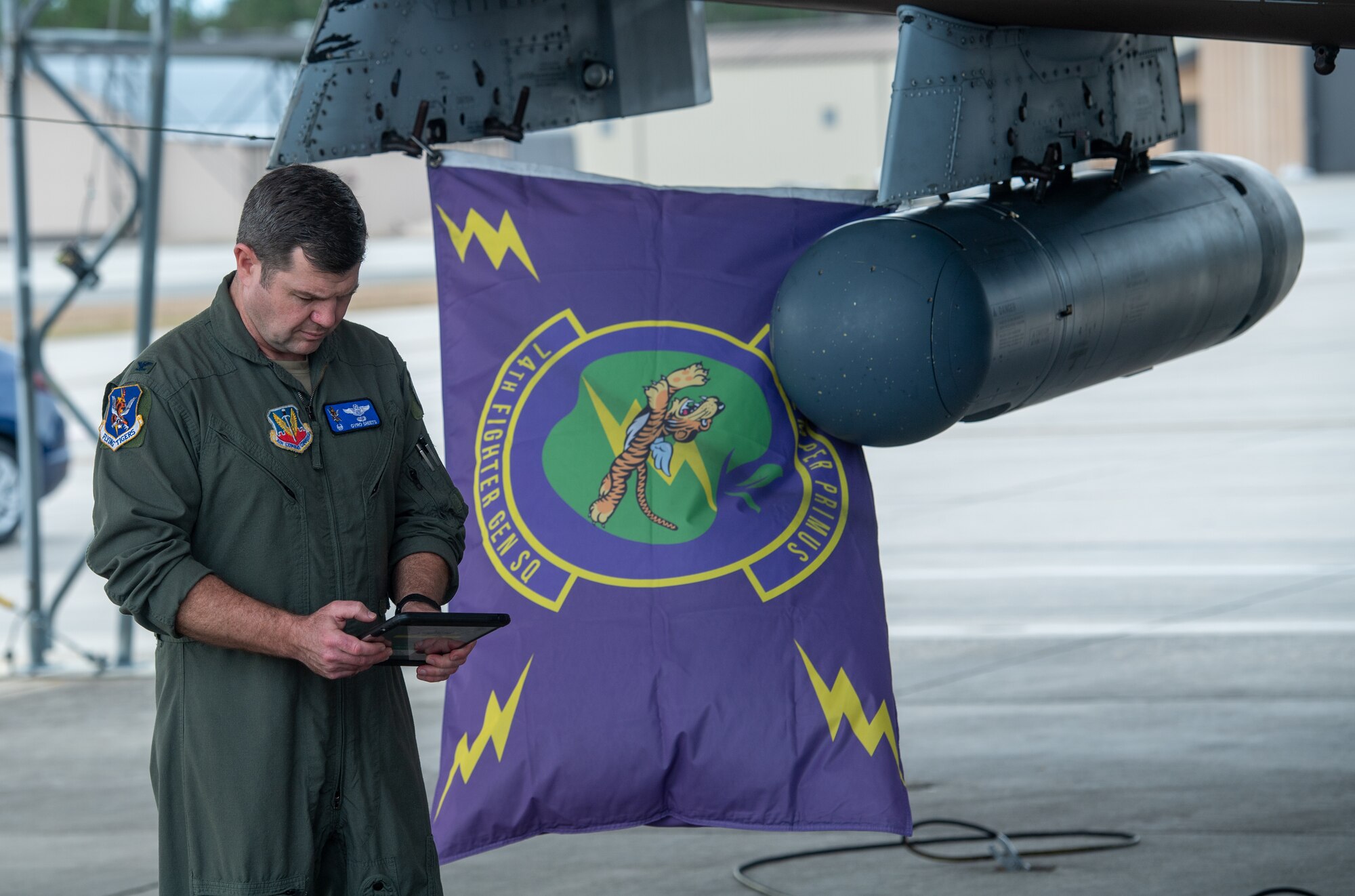U.S. Air Force Col. Paul Sheets, 23rd Wing commander, inspects an A-10C Thunderbolt II during a Top Tiger competition at Moody Air Force Base, Georgia, Jan 26th, 2024. Sheets inspected the aircraft as one of the judges for the quarterly competition. (U.S. Air Force photo by Airman Cade Ellis)