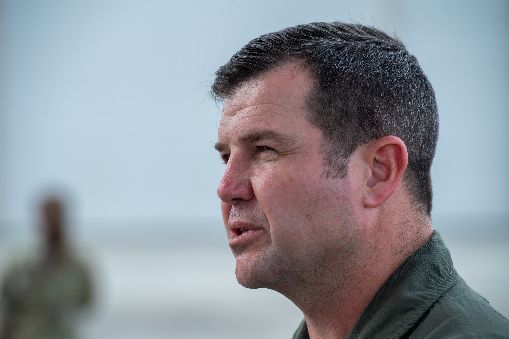 U.S. Air Force Col. Paul Sheets, 23rd Wing commander, speaks to an Airman at Moody Air Force Base, Georgia, Jan. 26th, 2024. Sheets asked Airmen questions to test their aircraft knowledge during the quarterly Top Tiger competition. (U.S. Air Force photo by Airman Cade Ellis)
