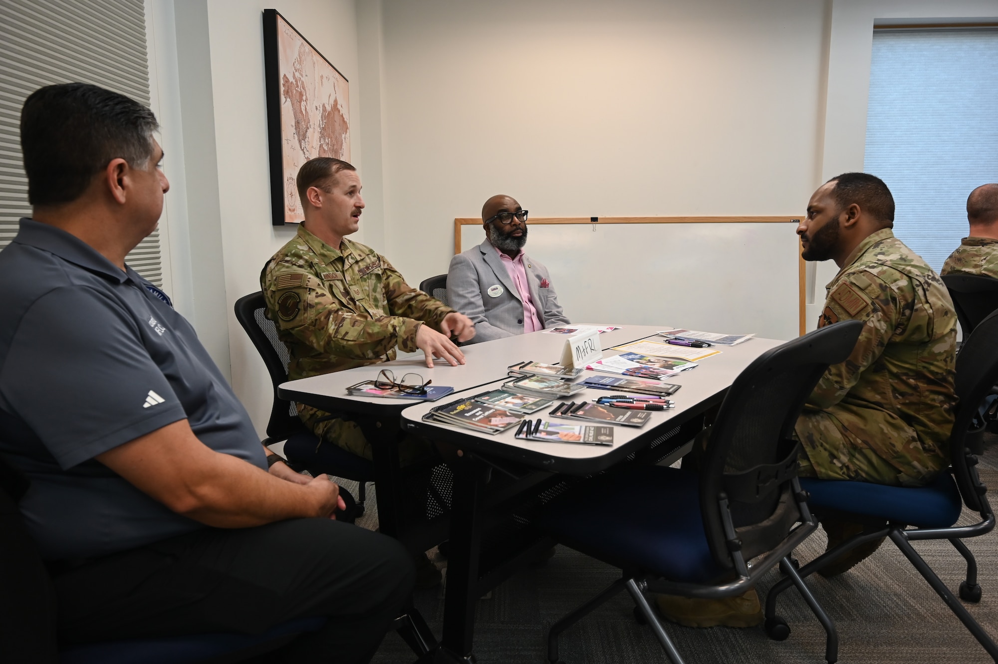 Airmen speak about various services provided by the 47th Force Support Squadron Military and Family Readiness Center (MFRC) at Laughlin Air Force Base, Texas, Jan. 31, 2023. The MFRC offers many services to Airmen and their families at Laughlin, such as military and family life counselors, the Transition Assistance Program, and the Employment Assistance program.  (U.S. Air Force photo by Airman 1st Class Keira Rossman)