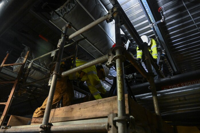 Members in support of Joint Task Force-Red Hill (JTF-RH) unbolt a spectacle blind to remove residual fuel from the Red Hill Bulk Fuel Storage Facility Jan. 24, 2024, Halawa, Hawaii.