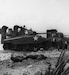 M4A1 Tanks with snorkeling gear land on Kwajalein’s Red Beach and move inland to support the infantry.  (National Archives)
