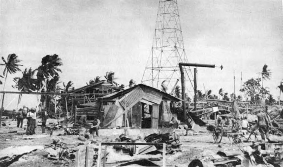 A demolished communications center and built up area on Kwajalein.