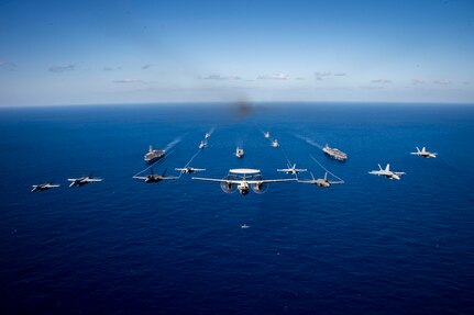 PHILIPPINE SEA (Jan. 31, 2024) Aircraft assigned to Carrier Air Wing (CVW) 2, fly in formation during multi large deck event (MLDE) held in the Philippine Sea, Jan. 31. MLDE provides the U.S. Navy and Japan Maritime Self Defense force an opportunity to engage in joint operations to include enhanced maritime communication operations, air warfare operations and cross-deck flight operations to strengthen maritime integrated-at-sea operations and combat readiness. (U.S. Navy photo)