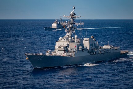 240131-N-ES141-1011
PHILIPPINE SEA (Jan. 31, 2024) The Arleigh Burke-class guided-missile destroyer USS Daniel Inouye (DDG 118), front, and the guided-missile cruiser USS Princeton (CG 59), during multi large deck event (MLDE) held in the Philippine Sea, Jan. 31. MLDE provides the U.S. Navy and Japan Maritime Self Defense force an opportunity to engage in joint operations to include enhanced maritime communication operations, air warfare operations and cross-deck flight operations to strengthen maritime integrated-at-sea operations and combat readiness. (U.S. Navy photo by Mass Communication Specialist 3rd Class Robert Hicks)