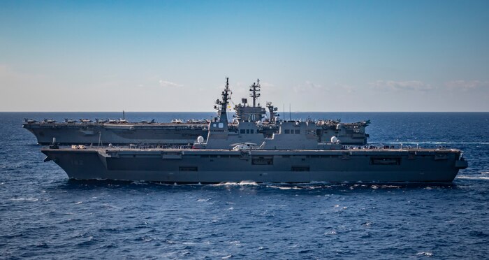 240131-N-ES141-1013
PHILIPPINE SEA (Jan. 31, 2024) The Japan Maritime Self-Defense Force helicopter destroyer JS Ise (DDH 182), front, and the Nimitz-class aircraft carrier USS Carl Vinson (CVN 70), sail in formation during multi large deck event (MLDE) held in the Philippine Sea, Jan. 31. MLDE provides the U.S. Navy and Japan Maritime Self Defense force an opportunity to engage in joint operations to include enhanced maritime communication operations, air warfare operations and cross-deck flight operations to strengthen maritime integrated-at-sea operations and combat readiness. (U.S. Navy photo by Mass Communication Specialist 3rd Class Robert Hicks)