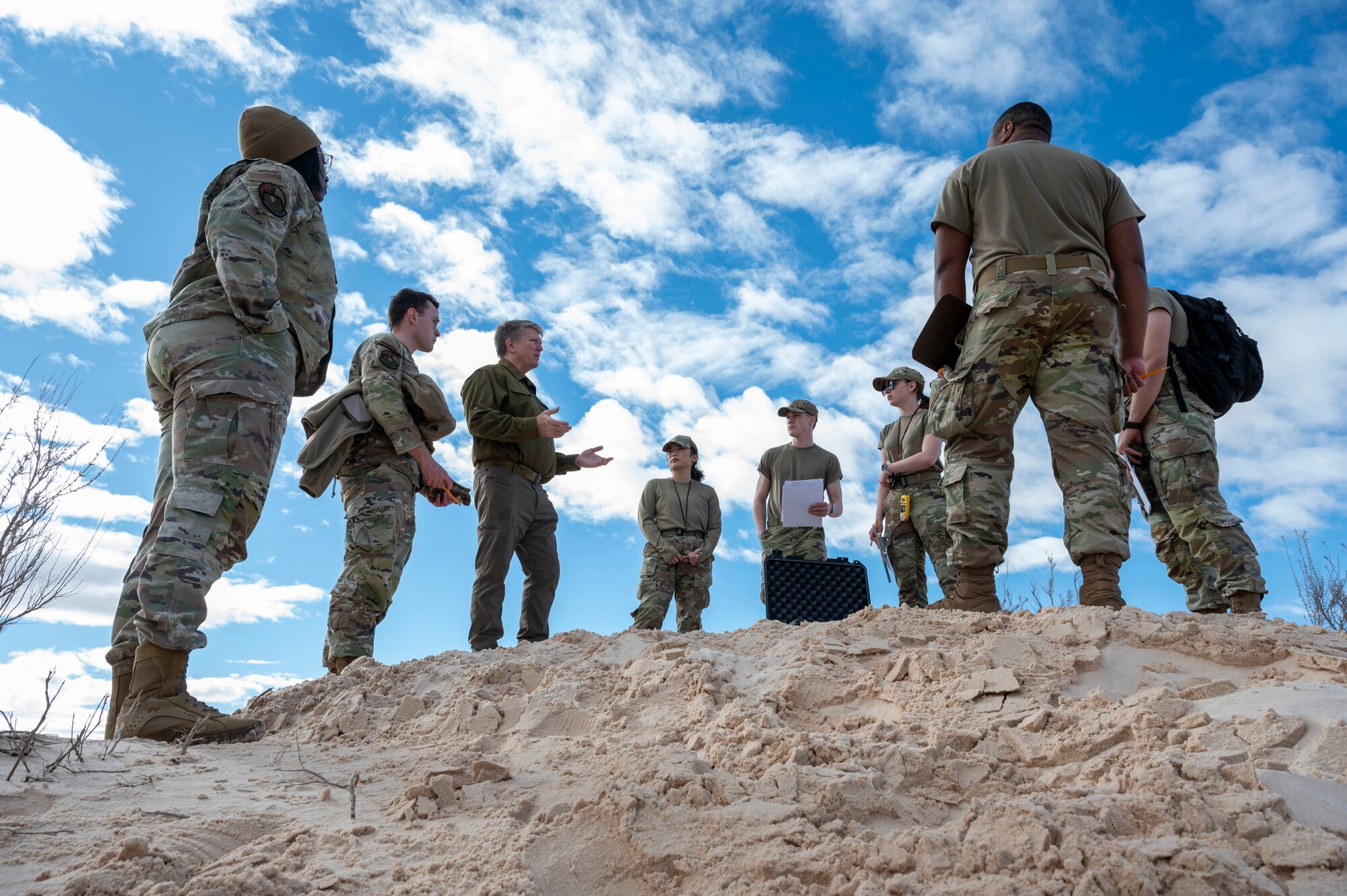 John Brody, 54th Operations Support Squadron weather flight meteorological technician, briefs 54th OSS weather flight Airmen about their roles and responsibilities for an exercise at Holloman Air Force Base, New Mexico, Jan. 22, 2024. The 54th OSS is responsible for the forecast management for the entirety of the base and ensuring Holloman’s flying mission continues safely. (U.S Air Force photo by Airman 1st Class Isaiah Pedrazzini)