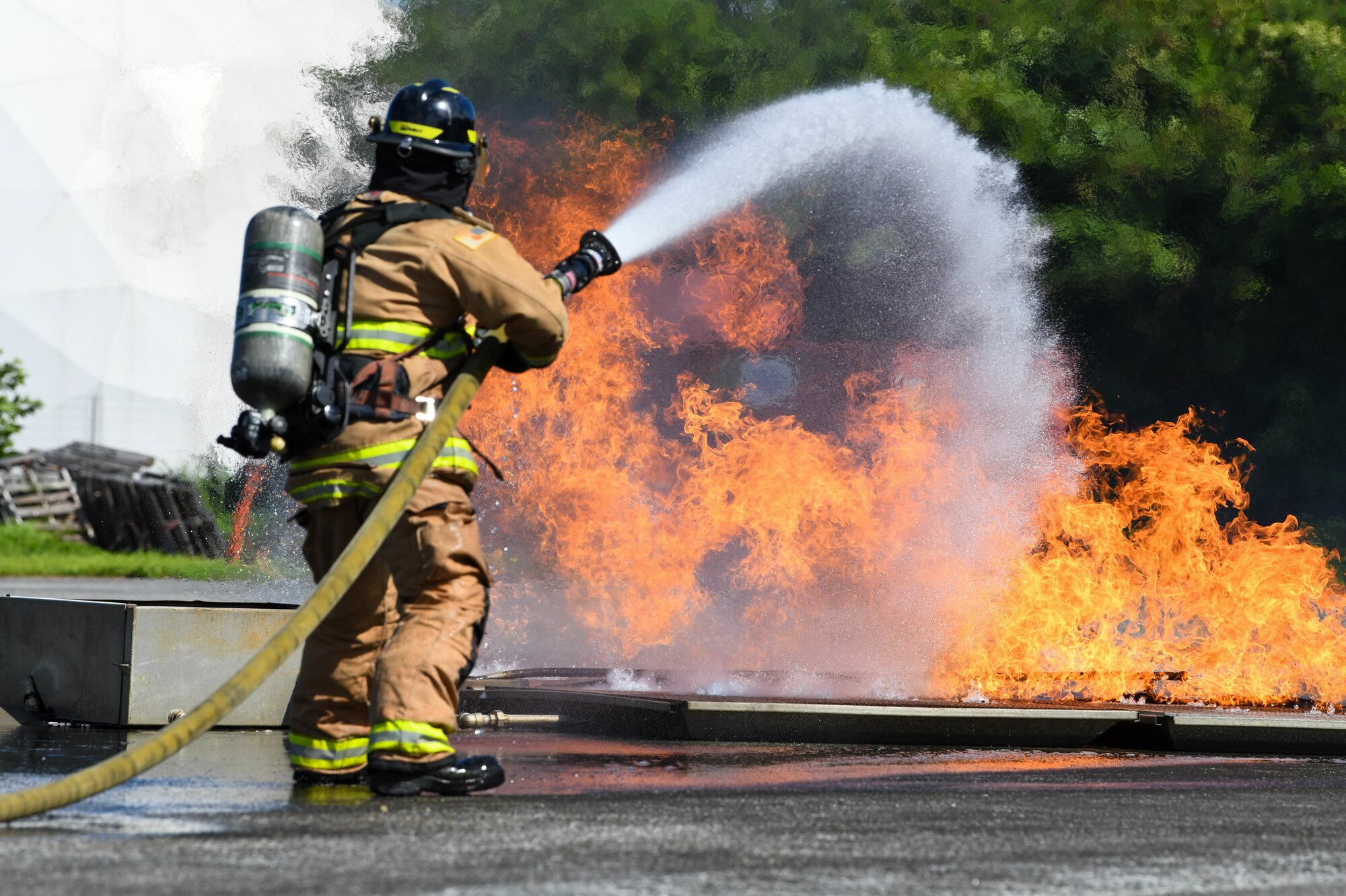 Kadena firefighter faces off with roaring oil fire