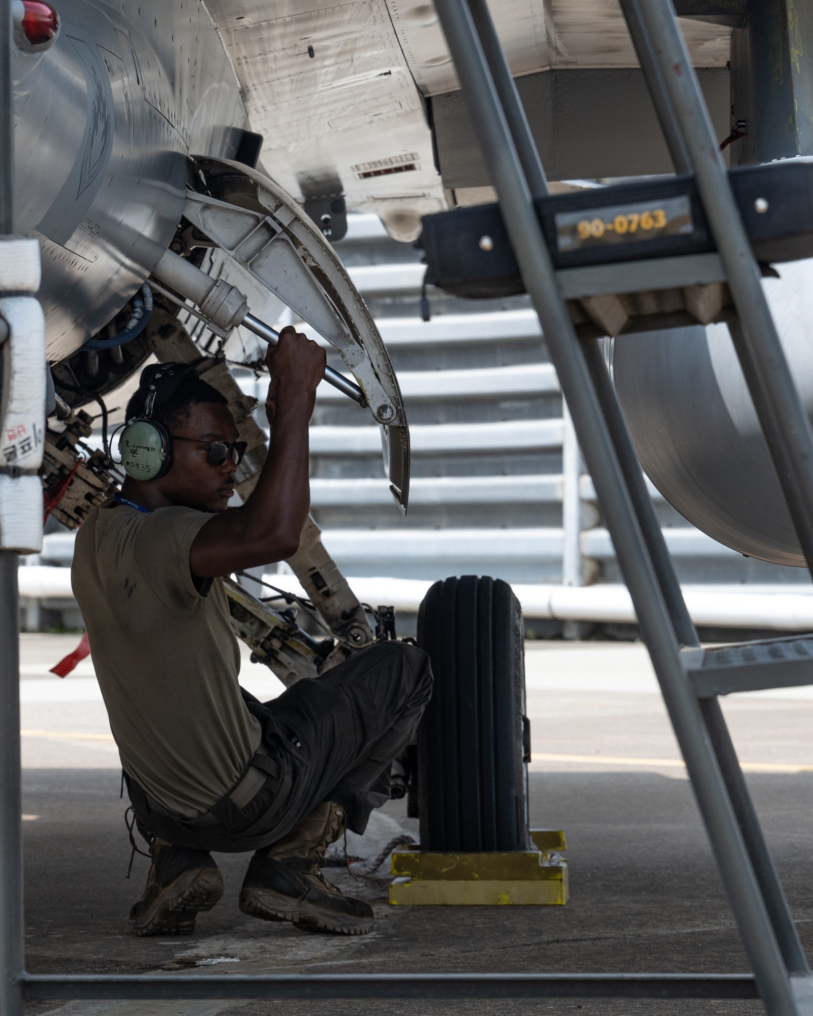 U.S. Air Force Airman 1st Class Zakkee Conwell, 80th Fighter Generation Squadron crew chief, performs post-flight checks on an F-16 Fighting Falcon aircraft at Cheongju Air Base, Republic of Korea.