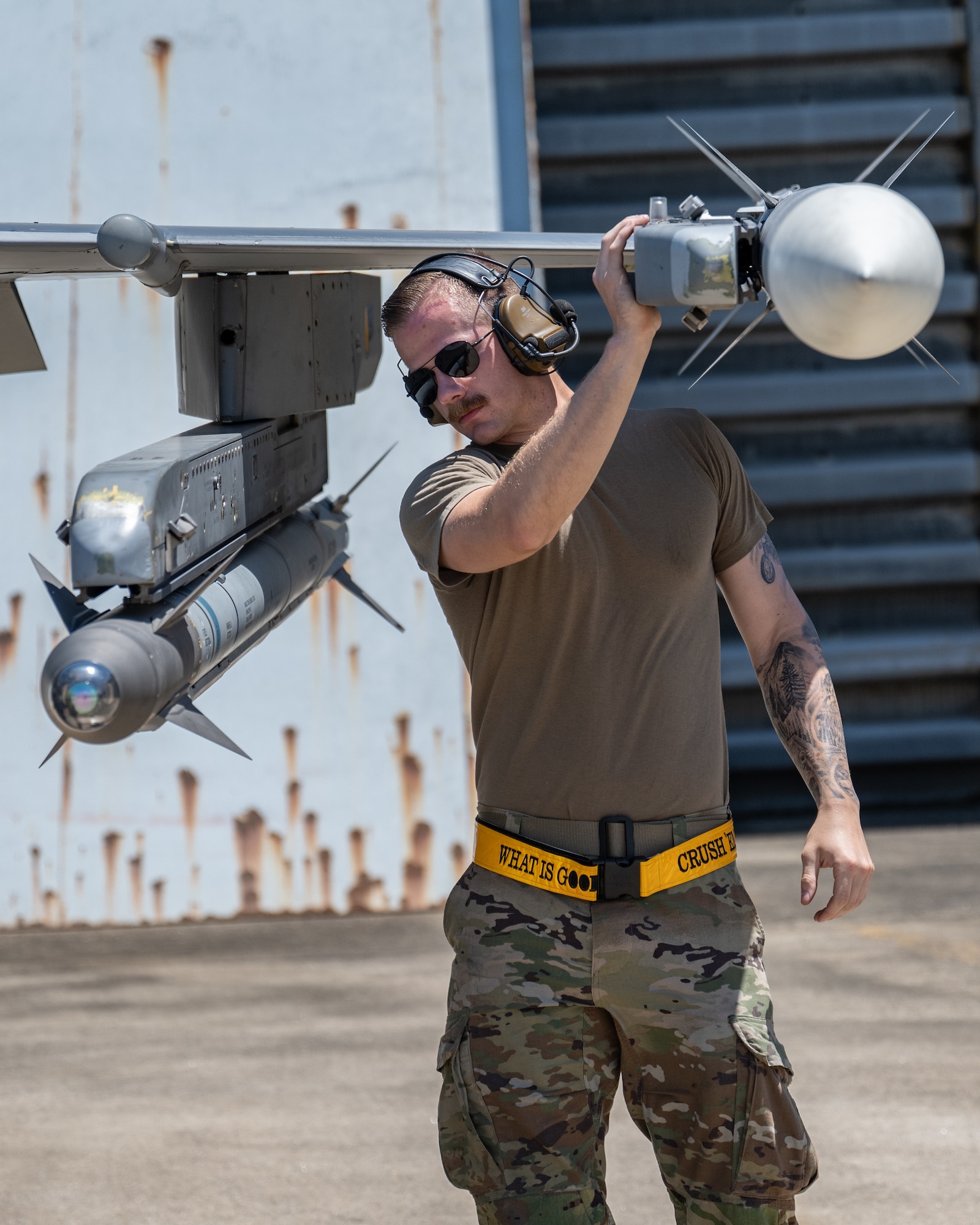 U.S. Air Force Airman First Class Ace Dupent, 80th Fighter Generation Squadron weapons specialist, inspects the armament of an F-16 Fighting Falcon aircraft before take off during Buddy Squadron 24-4 at Cheongju Air Base, Republic of Korea.