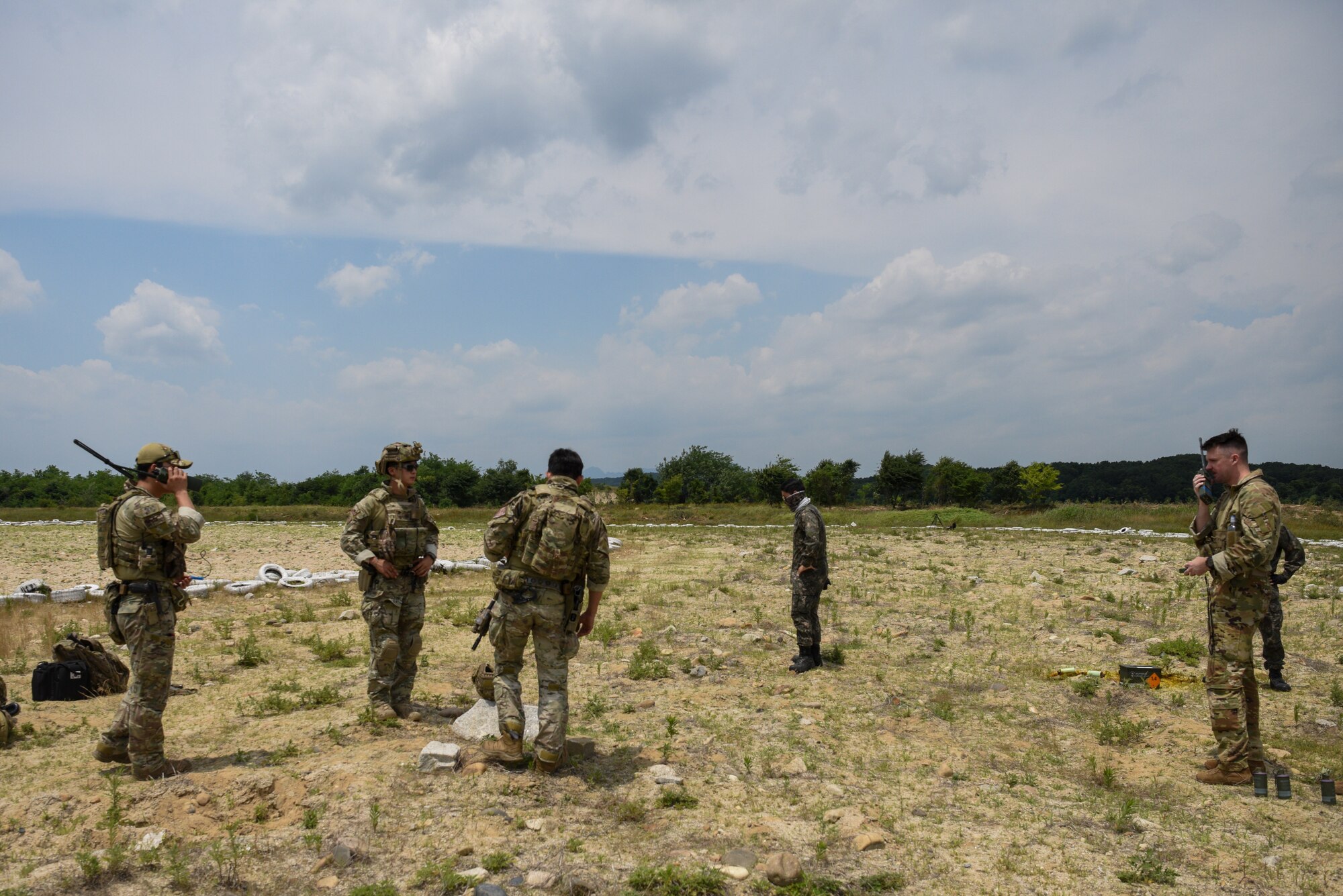 Personnel from the U.S. Air Force 607th Air Support Operations Group coordinate with Republic of Korea combat controllers during a combined ROK and U.S. cargo drop training event near Yeoju, Republic of Korea.