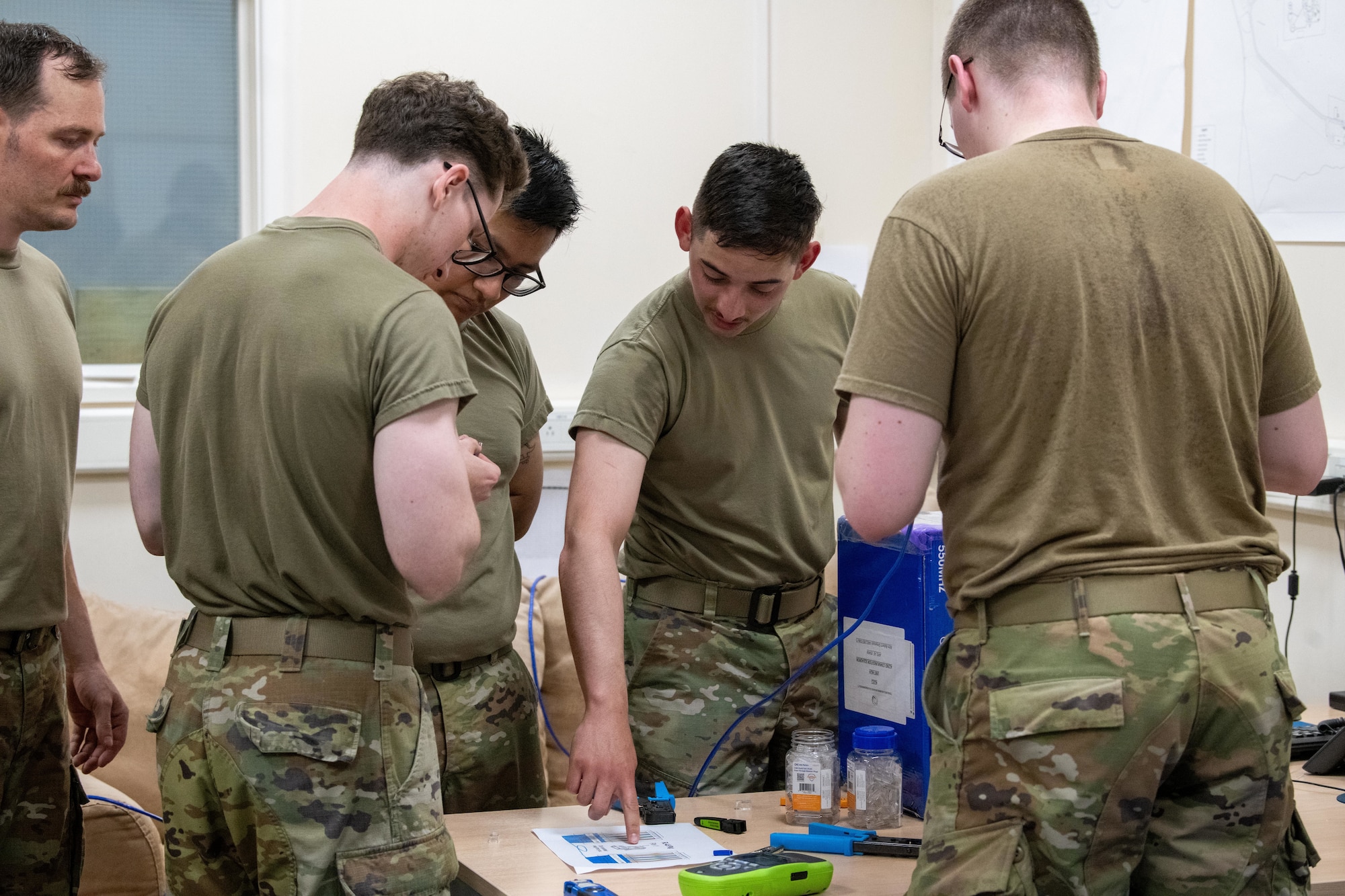 Airmen build category 6 cables during a Tiger Challenge