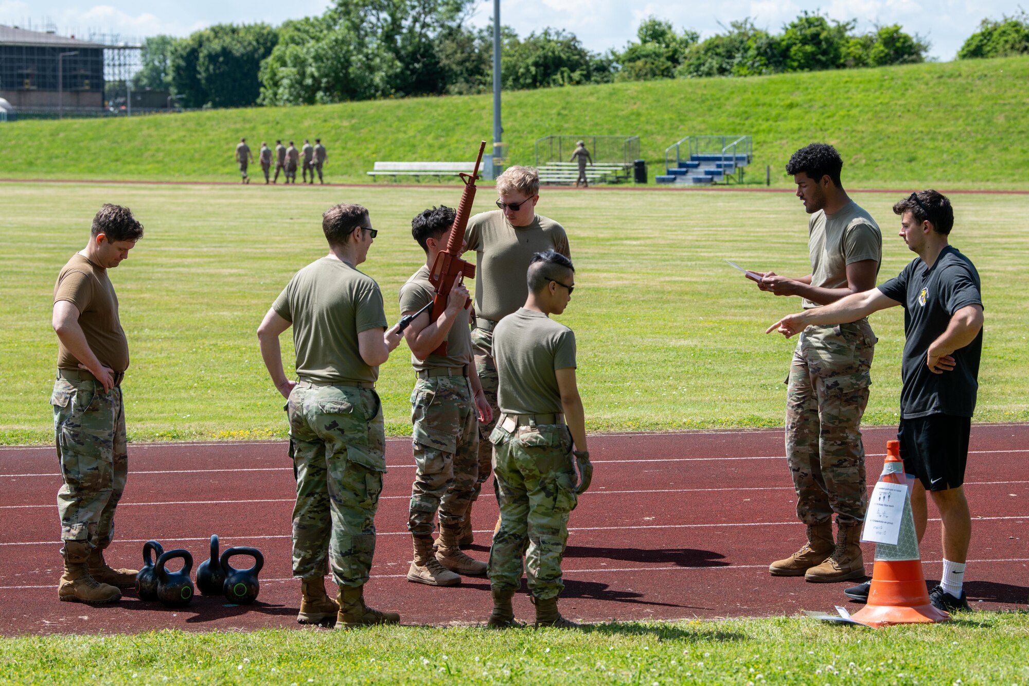 Airmen listen to instructions during a Tiger Challenge