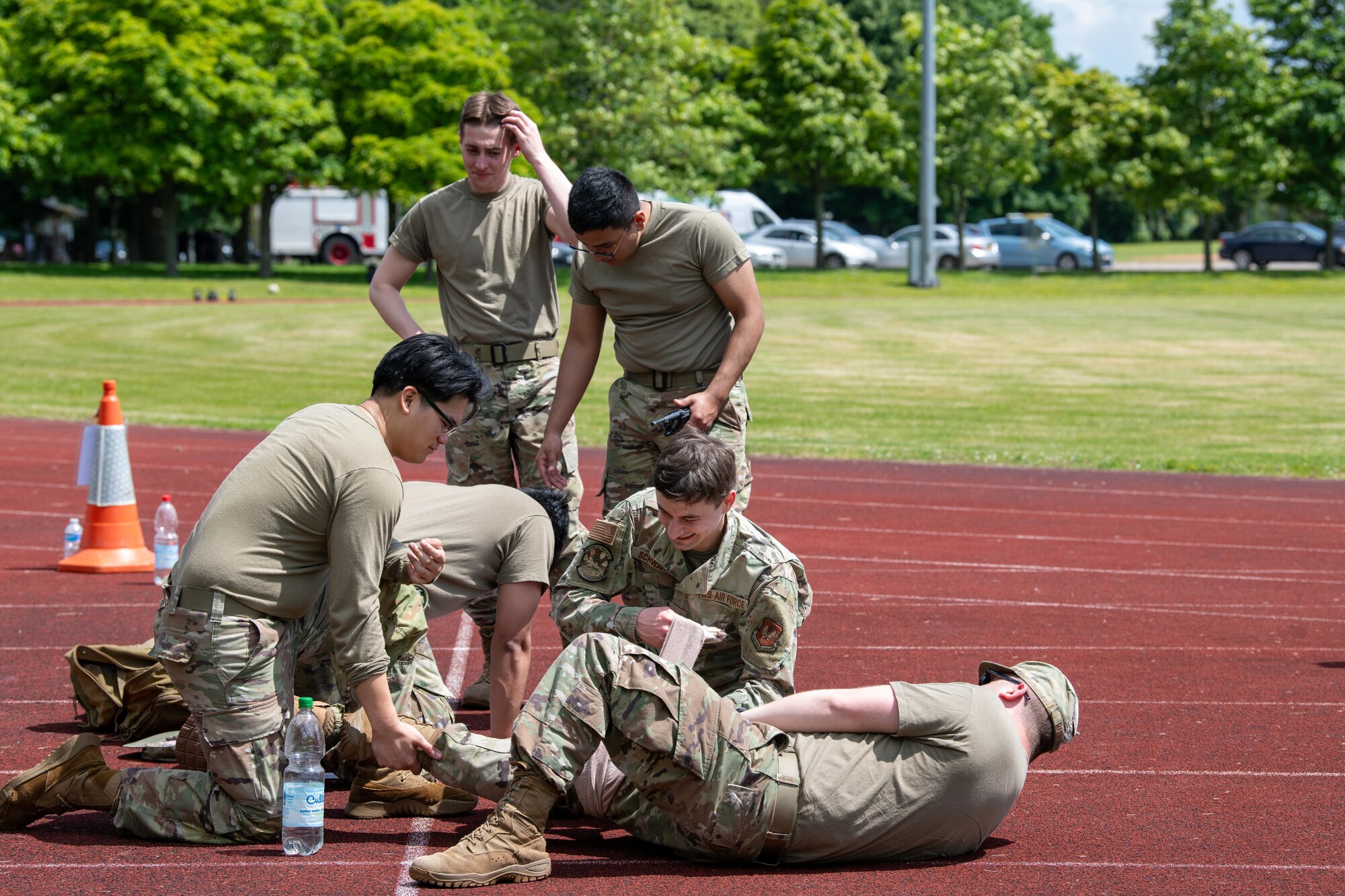 Airmen perform tactical combat casualty care during a Tiger Challenge