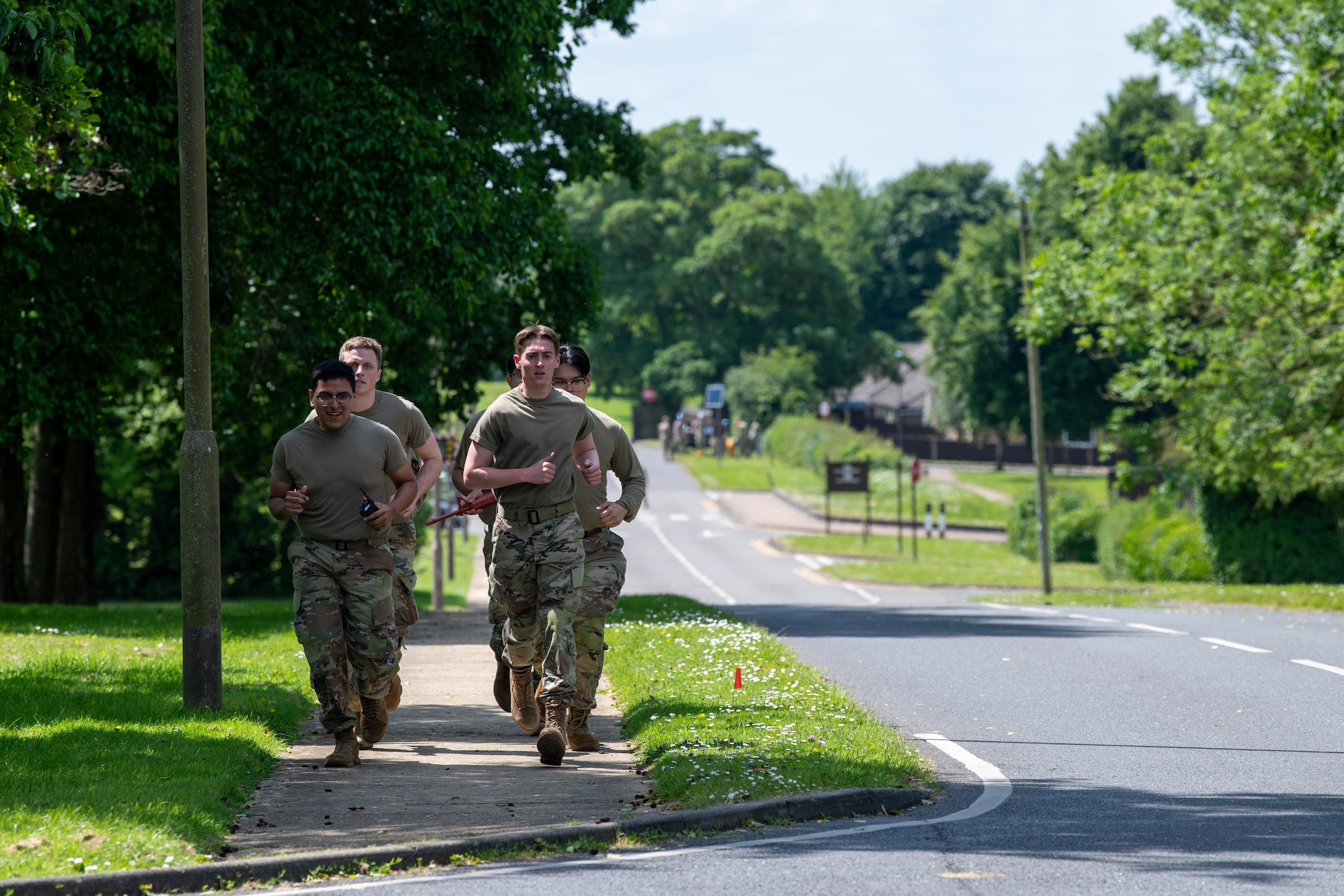 Airmen run in formation