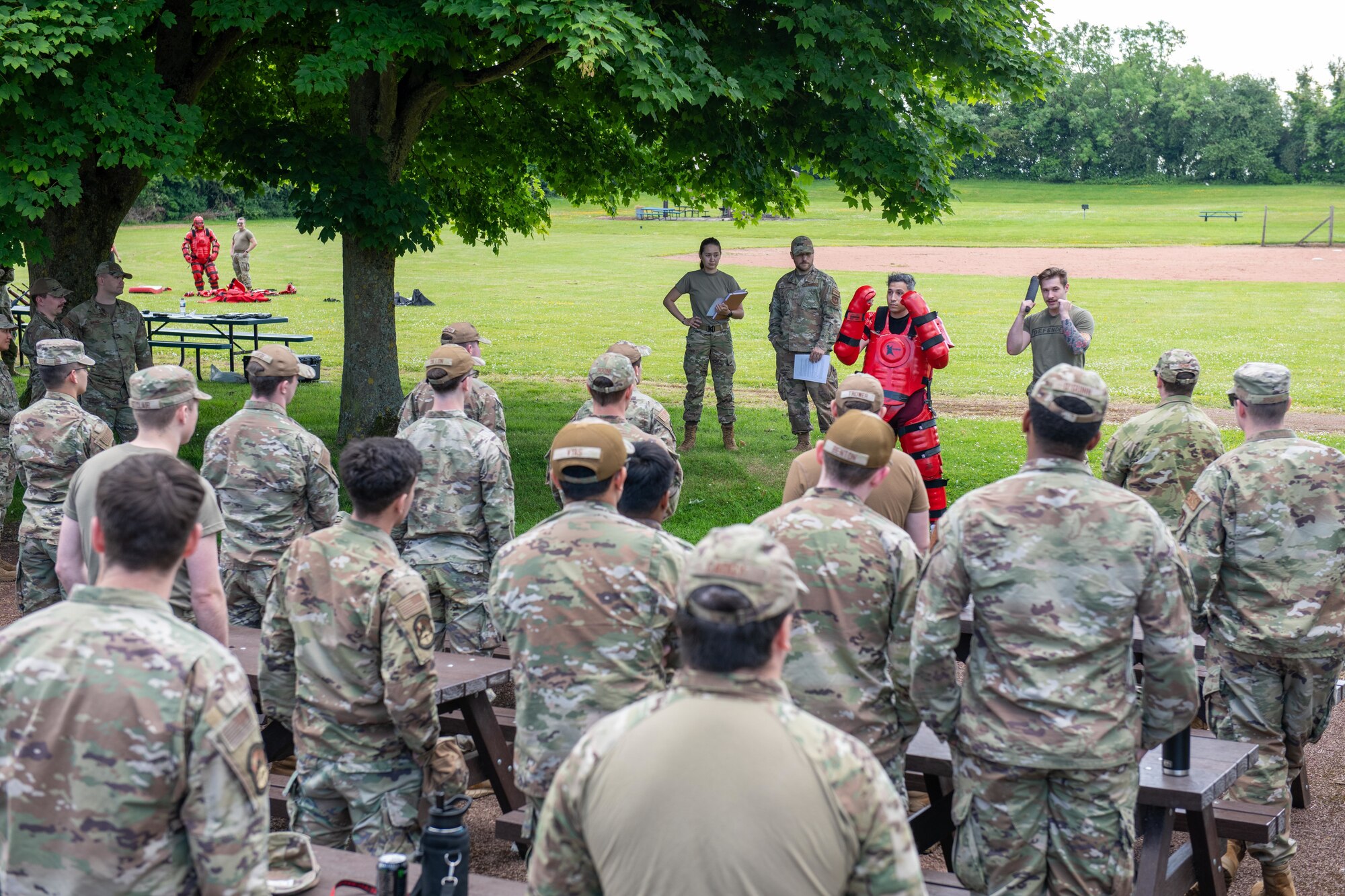 Airmen listen to a safety briefing