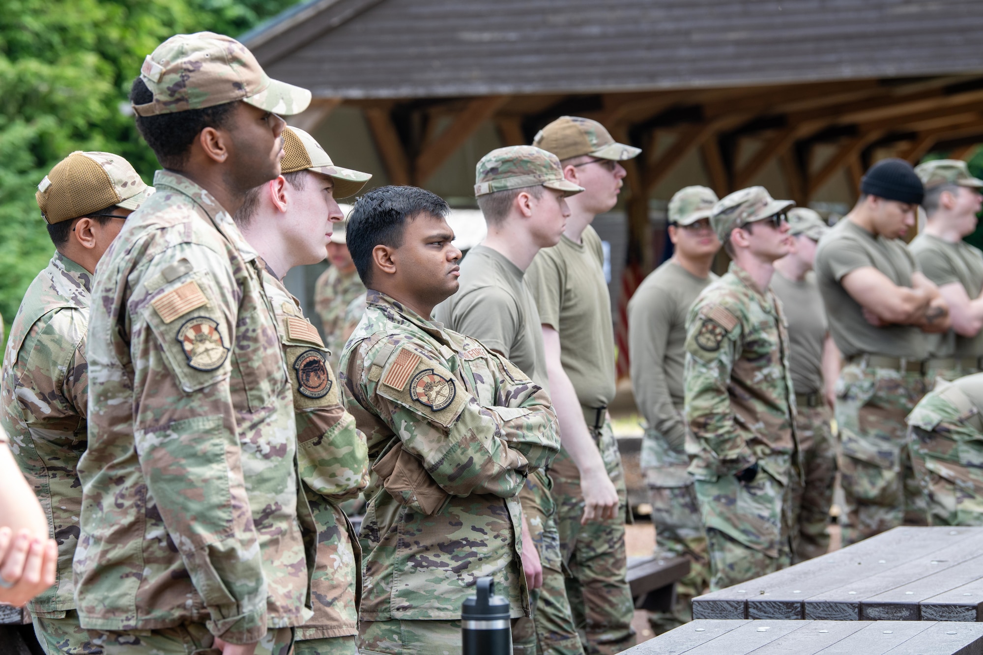 Airmen listen to a safety briefing