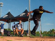 U.S. Army veteran Darnell Boynton winds up to throw the discus at field practice