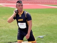 Spc. Alexis Pantoja of Team Army throws in the discus competition