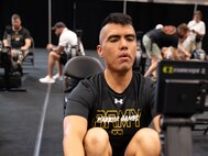 U.S. Army Spc. Alexis Pantoja practices indoor rowing