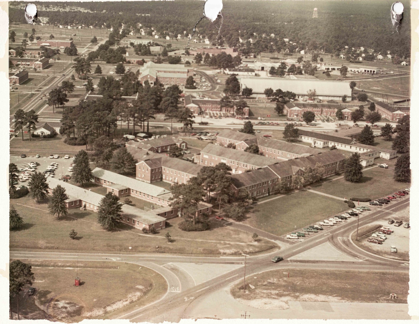 An aerial photo of Naval Hospital Cherry Point as it appeared when commissioned in July, 1968.  Sailors and staff of Naval Health Clinic Cherry Point celebrated the facility’s 56 years of the clinic’s role in the readiness of Marines serving in eastern North Carolina and the wellness of their families and nearby communities the first week of July, 2024.