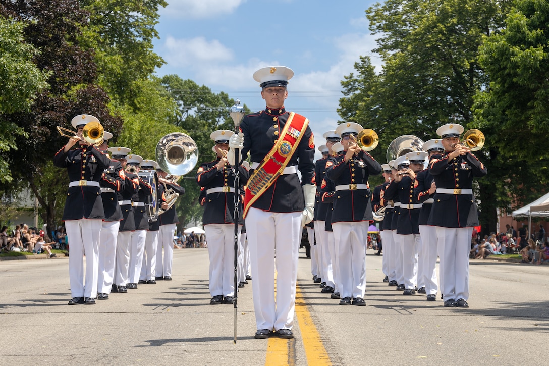 U.S. Marine Corps Musicians from Marine Forces Reserve Ceremonial Band performed at the 77th Annual Winona Steamboat Days, Winona, Minnesota, June 14-16, 2024. The Winona Steamboat Days celebrates for several days every year with live music, carnival rides, food, and daily activities. (U.S. Marine Corps photo by Gunnery Sgt. Theodore McElwee)