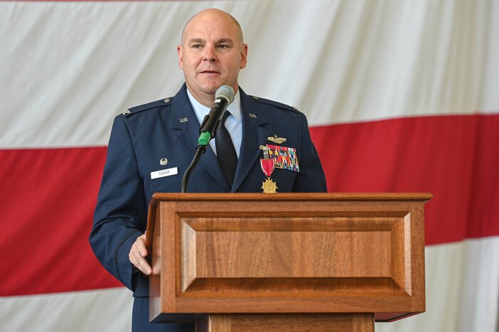 A U.S. Military officer speaks at a lectern