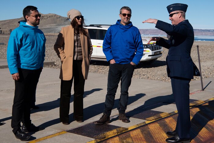 From the left, Múte Bourup Egede, Prime Minister of Greenland, Queen Mary, Queen of the Kingdom of Denmark, King Frederik X, King of the Kingdom of Denmark, and U.S. Space Force Col. Jason Terry, 821st Space Base Group commander, have a discussion together while standing on top of the iconic site D-Launch, located on the outskirts of Pituffik Space Base, Greenland, June 29, 2024. In pursuit of nuclear deterrence, D-launch served as an underground ice filled missile silo for the U.S. during the Cold War. (U.S. Space Force photo by 1st Lt. Danielle Rose)