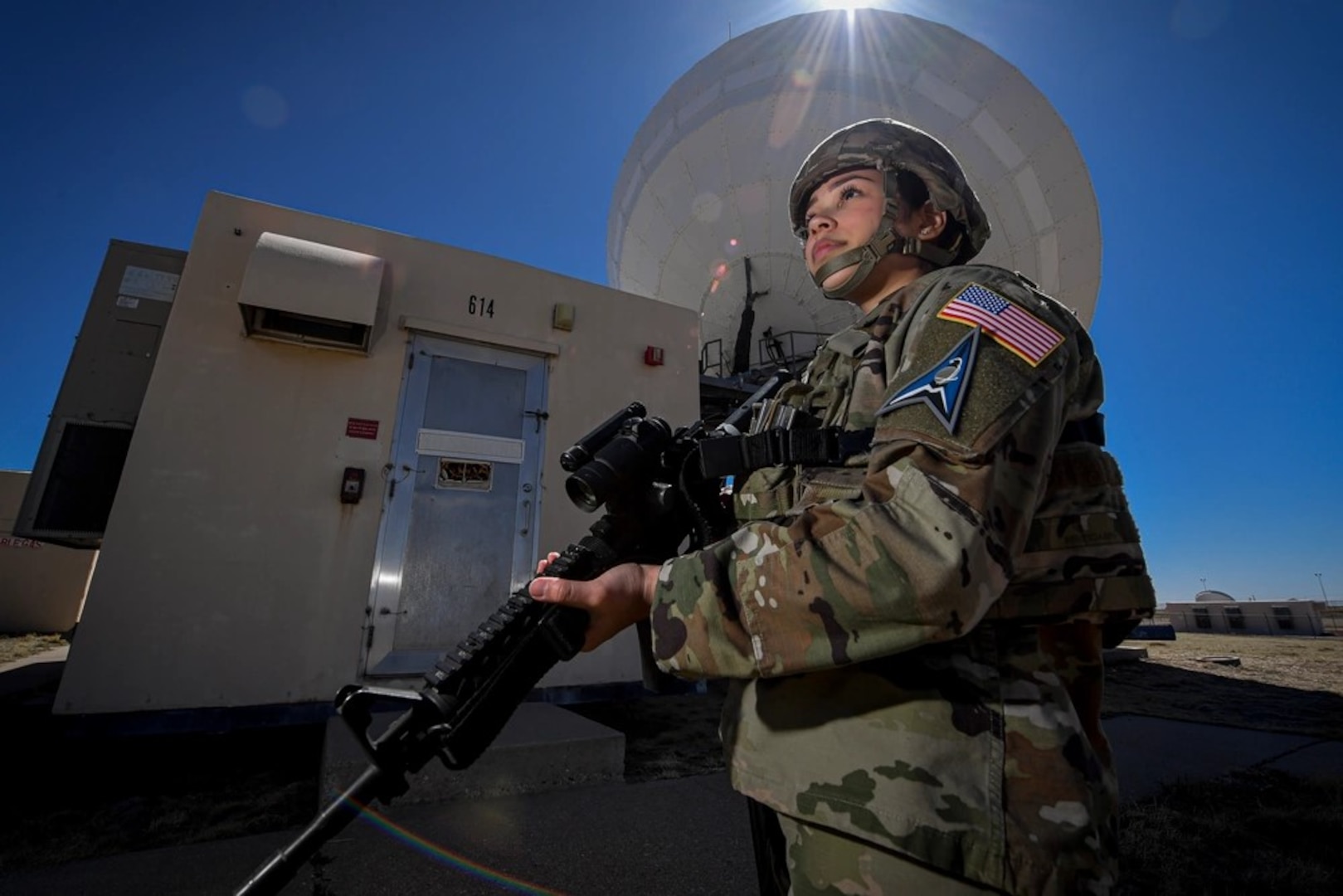 A Space Force Guardian protects a mobile satellite communication system