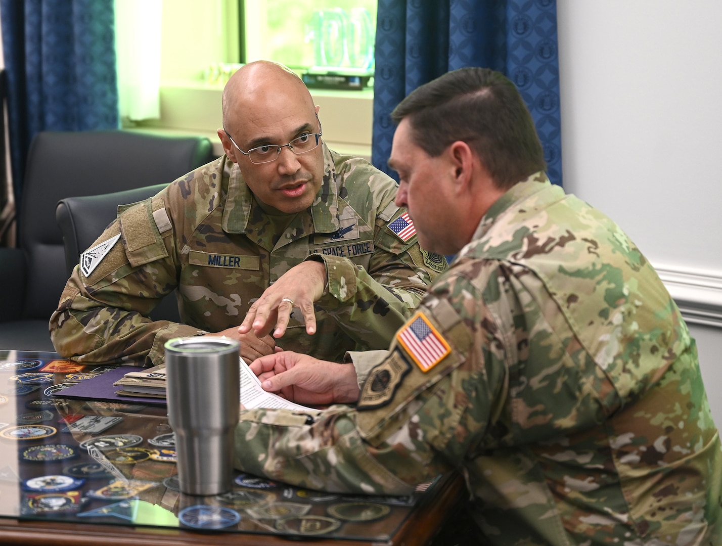 Chief of Space Operations Gen. Chance Saltzman receives a briefing from Commander of Space Operations Command Lt. Gen. David Miller