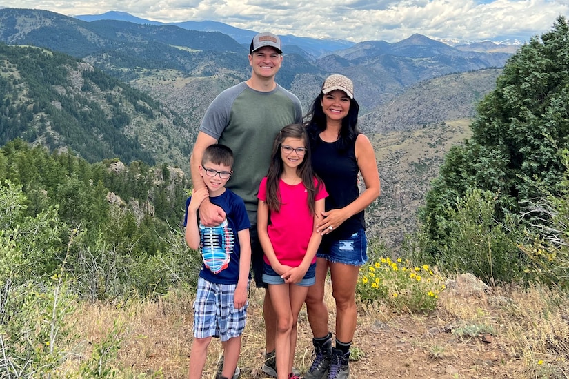 A family poses for a photo.