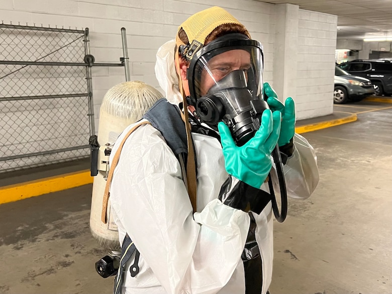 Sheri Williams, USACE, Savannah District, geologist, puts on protective gear while participating in the Hazardous Waste Operations and Emergency Response Technician training course, at the District headquarters building in Savannah, Georgia, June 5-6, 2024.