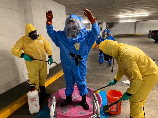 USACE, Savannah District, team members proceed through a simulated decontamination line during Hazardous Waste Operations and Emergency Response Technician training course, at the District headquarters building in Savannah, Georgia, June 6, 2024.