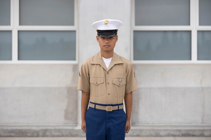 U.S. Marine Corps Pfc. Junyoung Kim with Echo Company, 2nd Recruit Training Battalion, poses for a photo prior to a graduation ceremony at Marine Corps Recruit Depot San Diego, California, June 28, 2024. Graduation took place at the completion of the 13-week transformation, which included training for drill, marksmanship, basic combat skills, and Marine Corps customs and traditions. Kim is a native of South Korea and was one of seven Marines with Echo Company who became U.S. citizens. Kim was recruited from Granada Hills, California. (U.S. Marine Corps photo by Lance Cpl. Alexandra M. Earl)