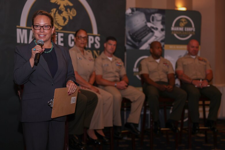 U.S. Marine Corps Sgt. Maj. Carlos A. Ruiz, a Mexico native and 20th sergeant major of the Marine Corps, has a discussion with attendees during the Mental Health Symposium at The Clubs at Quantico on Marine Corps Base Quantico, Virginia, June 27, 2024. The symposium aims to equip attendees with knowledge and skills to recognize, understand, and cope with what affects them from a mental health perspective. (U.S. Marine Corps photo by Lance Cpl. David Brandes)