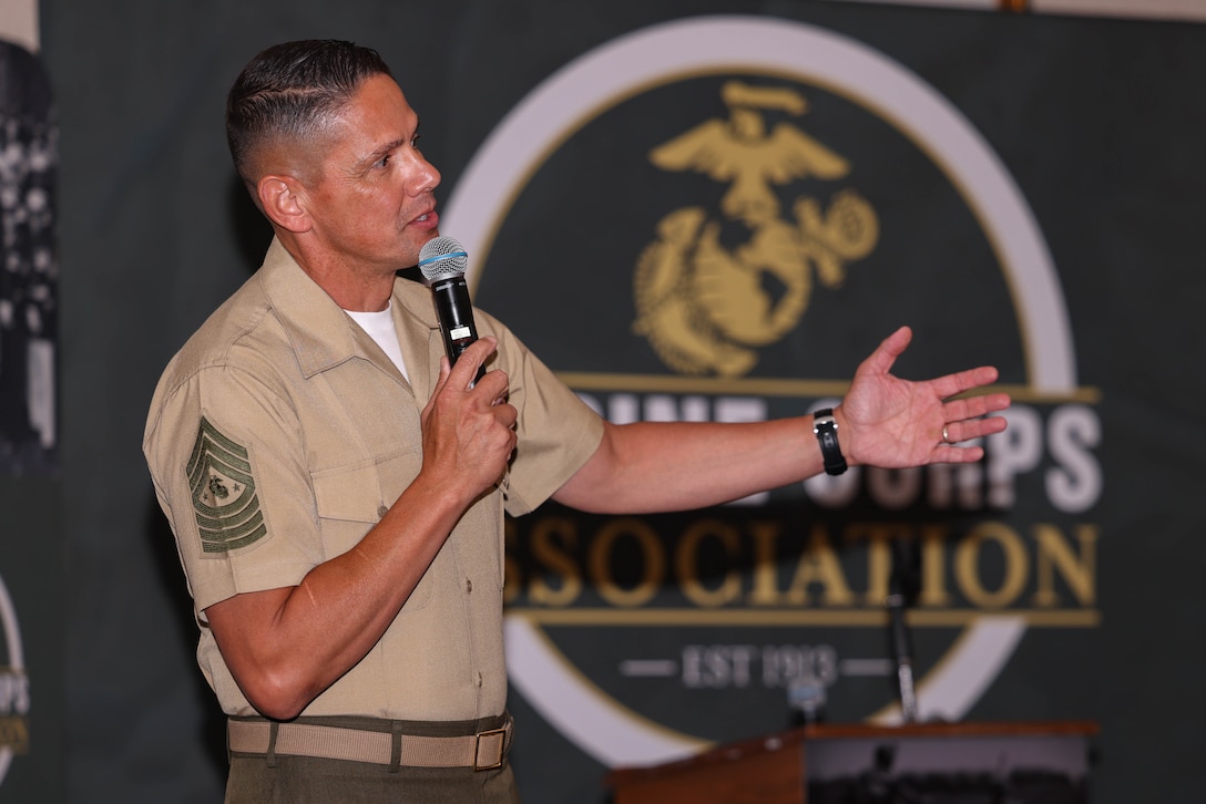 U.S. Marine Corps Sgt. Maj. Carlos A. Ruiz, a Mexico native and 20th sergeant major of the Marine Corps, has a discussion with attendees during the Mental Health Symposium at The Clubs at Quantico on Marine Corps Base Quantico, Virginia, June 27, 2024. The symposium aims to equip attendees with knowledge and skills to recognize, understand, and cope with what affects them from a mental health perspective. (U.S. Marine Corps photo by Lance Cpl. David Brandes)