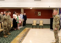 Newly designated 6th Chief of Cyber Col. John J. Hosey Jr. salutes Cyber Center of Excellence Commanding General Maj. Gen. Paul Stanton to conclude the Change of Command ceremony, June 18, 2024, at Fort Eisenhower, Ga.