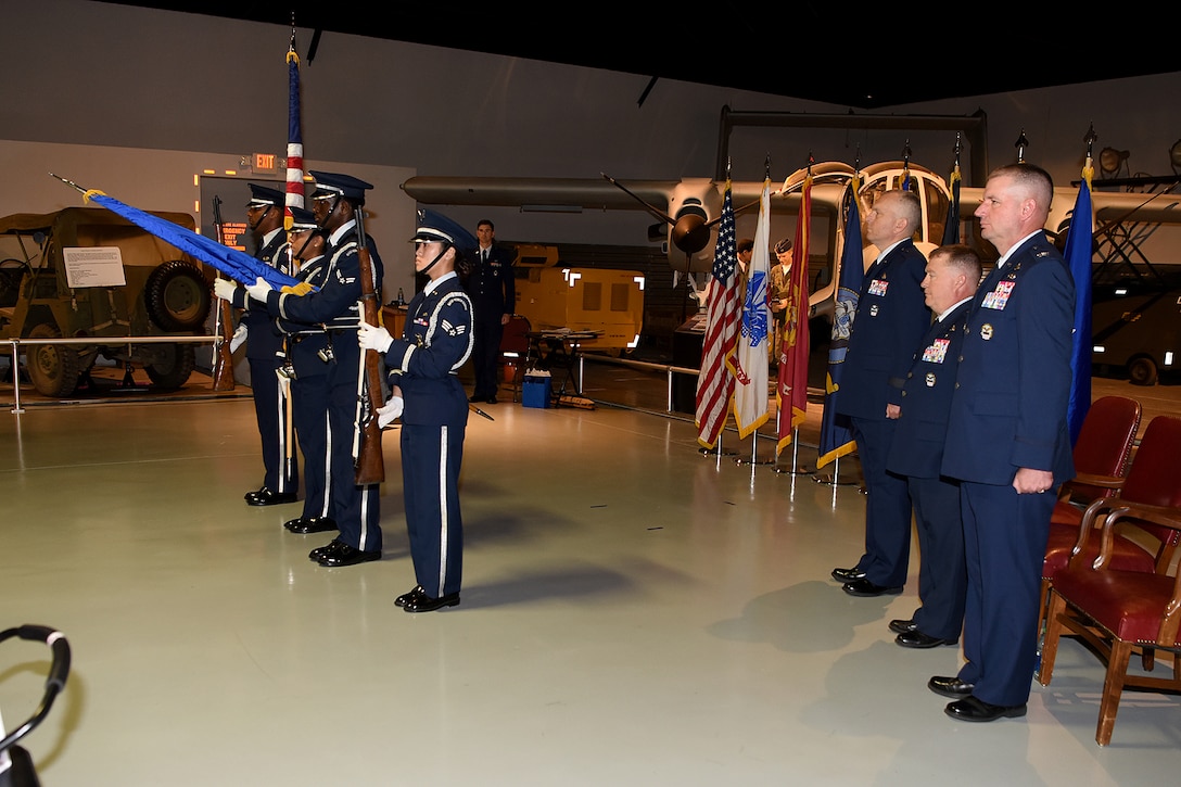 An honor guard presents the colors