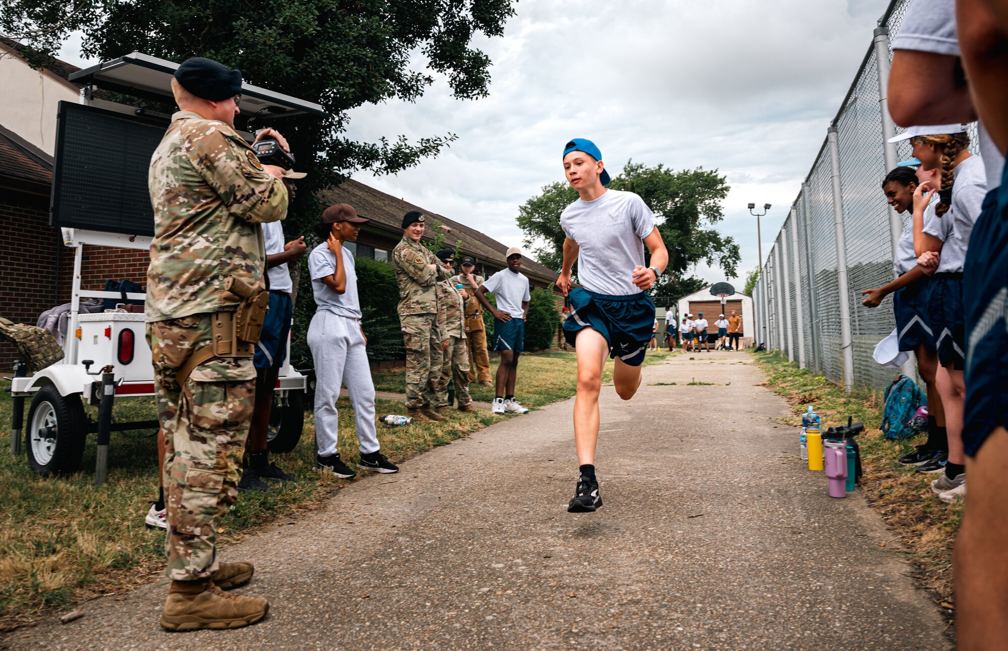 A cadet runs in Air Force pt uniform