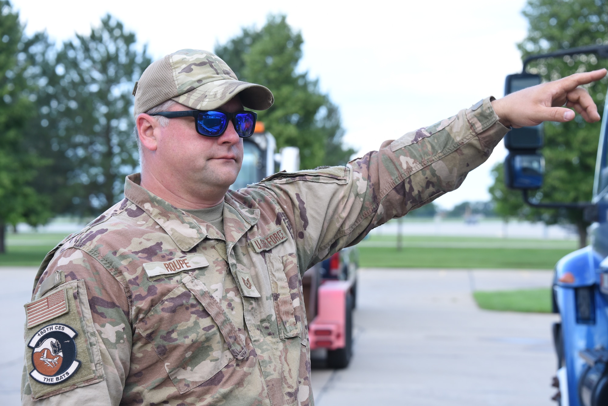 Tech. Sgt. Marcus Roupe, a 185th Air Refueling Wing Civil Engineering Squadron Water and Fuel Systems Maintenance specialist, directs the loading of equipment