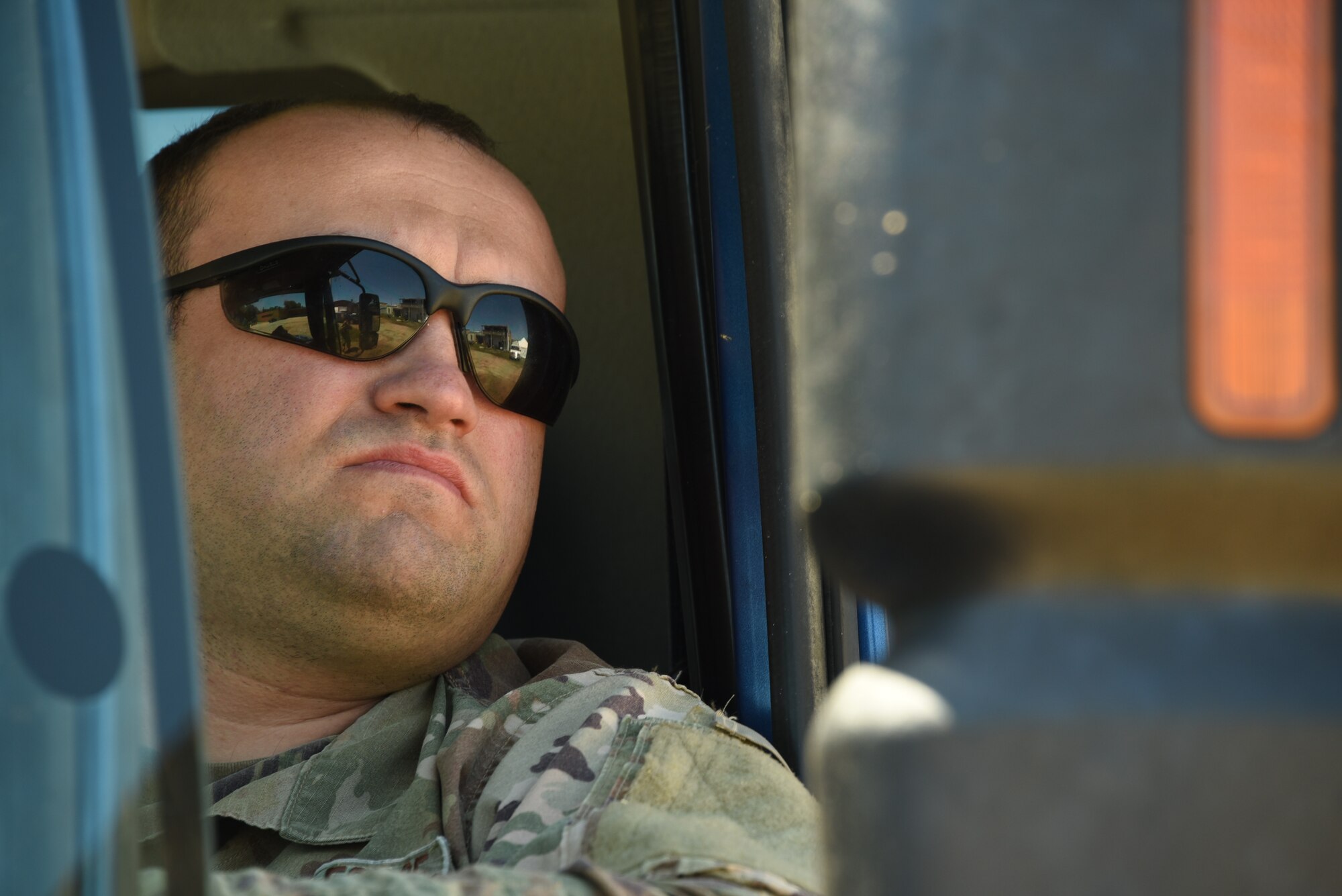 Tech. Sgt. Guard Matthew Fagan, a 185th Air Refueling Wing Production Controller, operates a dump truck