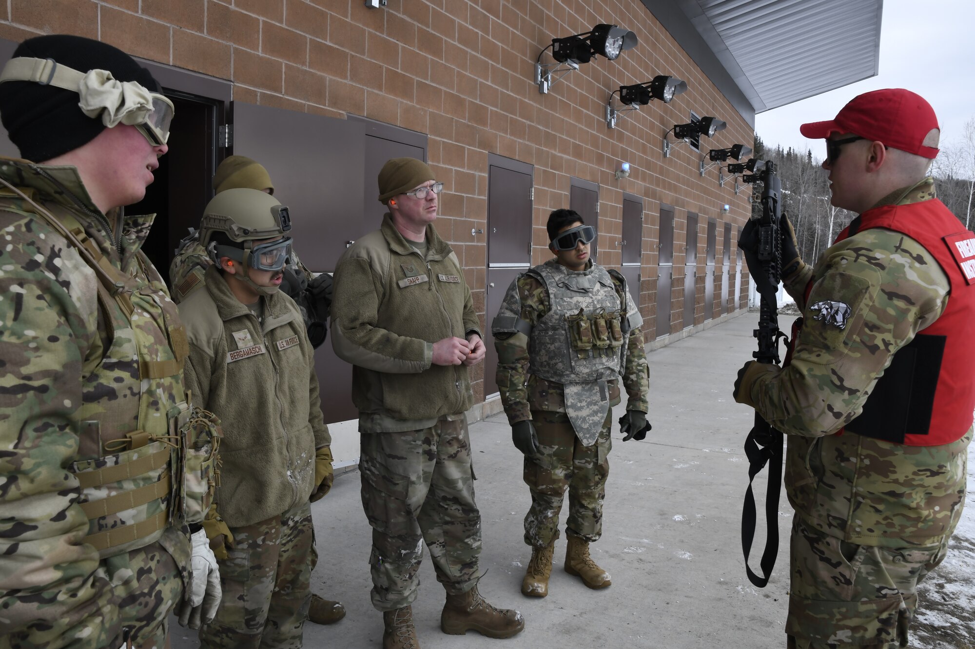 Tech Sgt. Trevor Auton, 168th Combat Arms Instructor, teaches the Shoot, Move, Communicate course to develop 168th Maintenace Group Multi-Capable Airmen at Eielson Air Force Base, Alaska