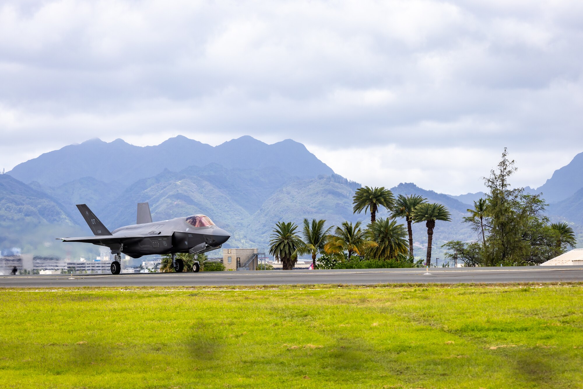 A U.S. Air Force F-35A Lightning II pilot, assigned to the 422nd Test and Evaluation Squadron, Nellis Air Force Base, Nevada, taxis the aircraft to the runway in preparation for takeoff at Joint Base Pearl Harbor-Hickam, Hawaii, June 5, 2024.