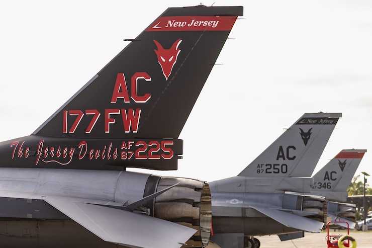 Three F-16 Fighting Falcon fighter jets from the 177th Fighter Wing, New Jersey Air National Guard, sit on the flight line at Joint Base Pearl Harbor-Hickam, Hawaii, June 6, 2024.