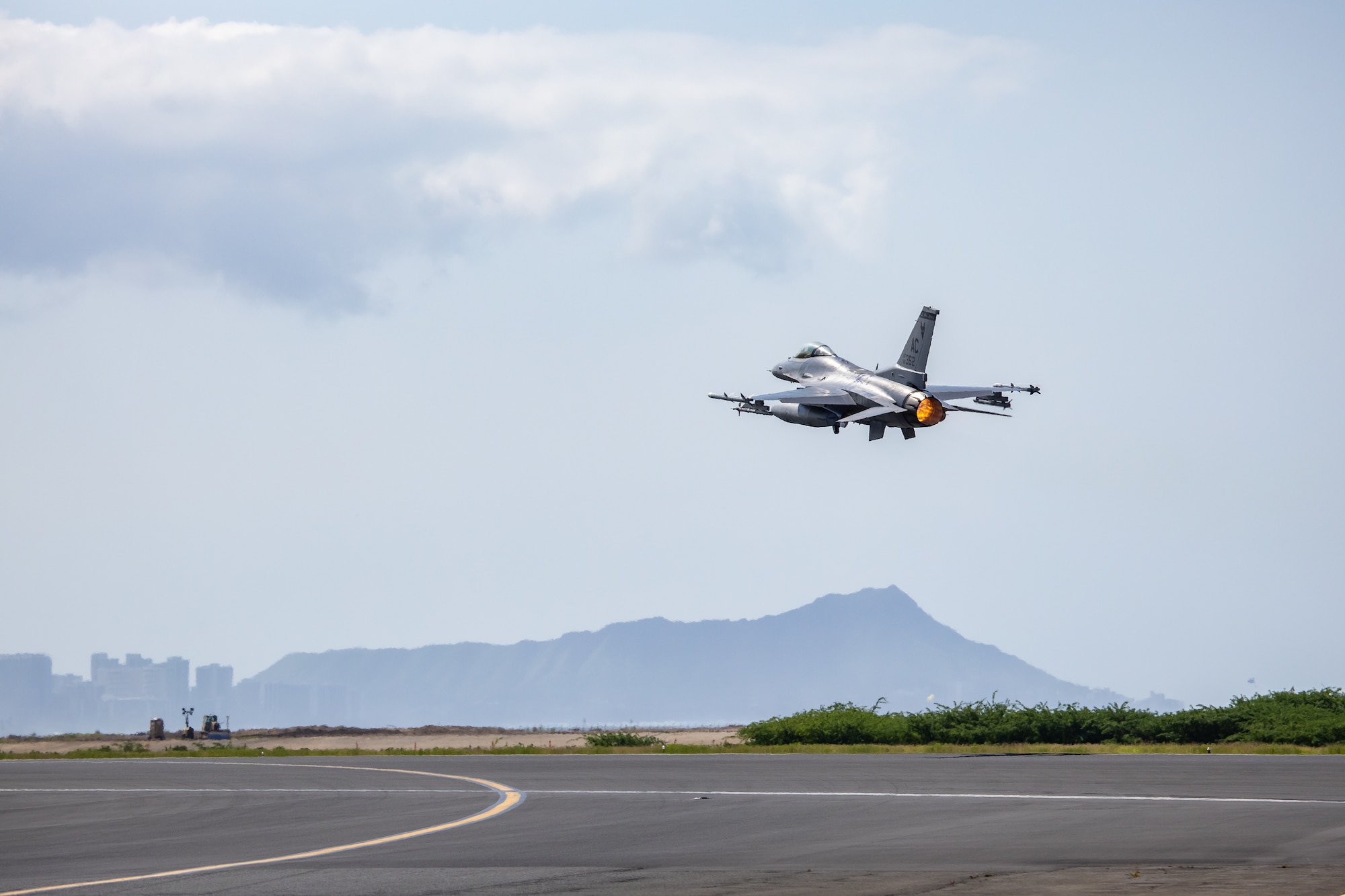 A U.S. Air Force F-16 Fighting Falcon fighter jet from the 177th Fighter Wing, New Jersey Air National Guard, takes off from Honolulu International Airport, Hawaii, June 6, 2024.