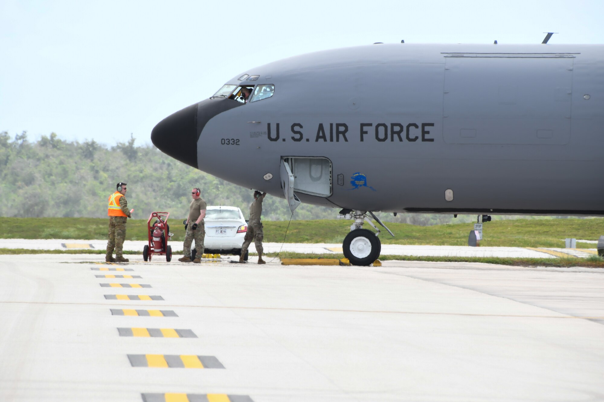 U.S. Air National Guard Airmen assigned to the 168th Wing Maintenance Group prepare to launch and send off an Alaska Air National Guard KC-135 Stratotanker on an air refueling mission over the Pacific during Exercise Agile Reaper 24-1.