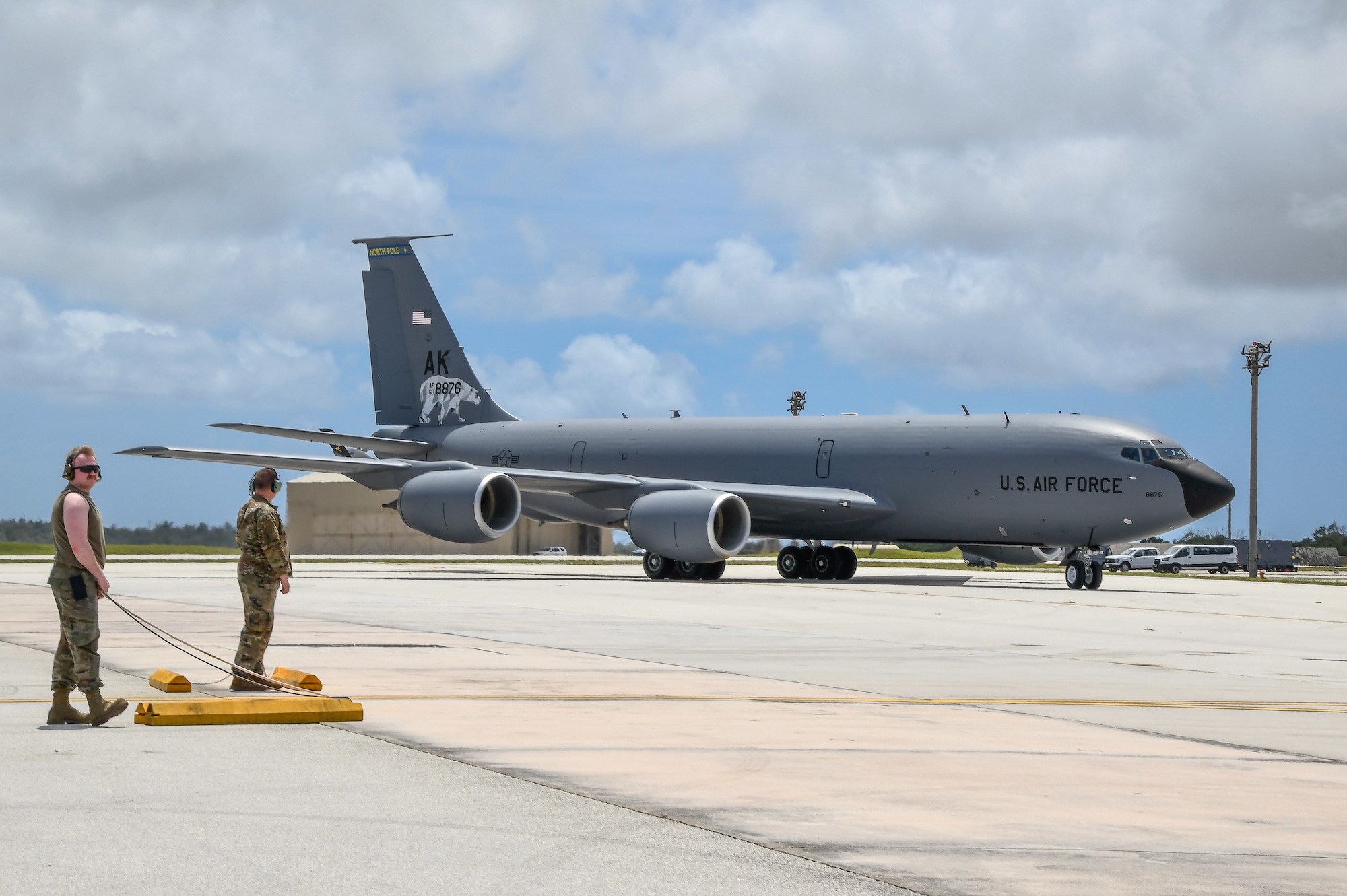 U.S. Air National Guard Airmen assigned to the 168th Wing Maintenance Group prepare to receive and place chalks on an Alaska Air National Guard KC-135 Stratotanker after returning from an air refueling mission over the Pacific during Exercise Agile Reaper 24-1 at Andersen Air Force Base, Guam.