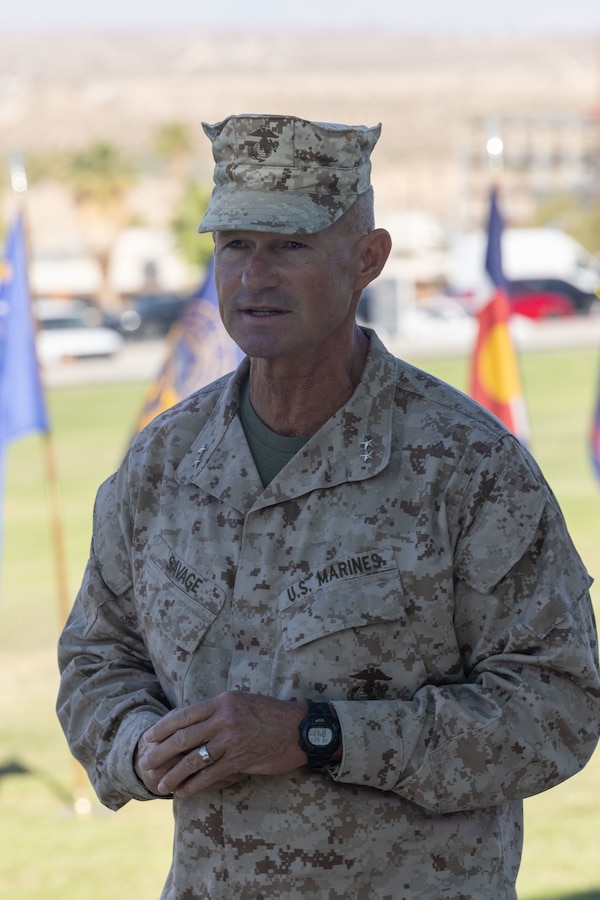 U.S. Marine Corps Maj. Gen. Thomas B. Savage, a Chico, California native, commanding general of Marine Air-Ground Task Force Training Command, Marine Corps Air-Ground Combat Center, gives a speech during a change of command ceremony at Lance Corporal Torrey Grey Field, MCAGCC, Twentynine Palms, California, June 21, 2024. The change of command ceremony represents the official passing of command from Col. Patrick Reynolds to Col. Leonel Brito Jr. (U.S. Marine Corps photo by Lance Cpl. Anna Higman)