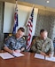 Commodore Shane Glassock, the director general for Logistics Operations Branch at the Joint Logistics Command and Maj. Gen. Jered Helwig, the commanding general of the 8th Theater Sustainment Command, signed a logistics letter of intent to establish the care of supplies in storage for U.S. Army equipment in Bandiana, Australia May 21, 2024.